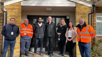 Cllr Mills, officers and Openreach staff at site of first building connected to full fibre under council's new partnership with Openreach.