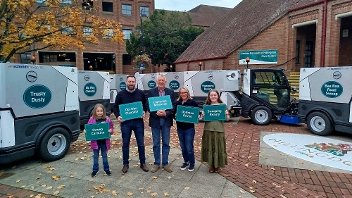 Cllr Eddie Lavery with four winners of the competition to name the council's seven new street sweepers