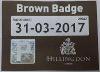Brown badge