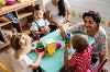 Nursery children playing in classroom